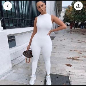 Brand new, sleeveless white jumpsuit